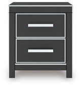 Zuraleus Black Queen Upholstered Bed, Dresser, Mirror and Nightstand - Ornate Home