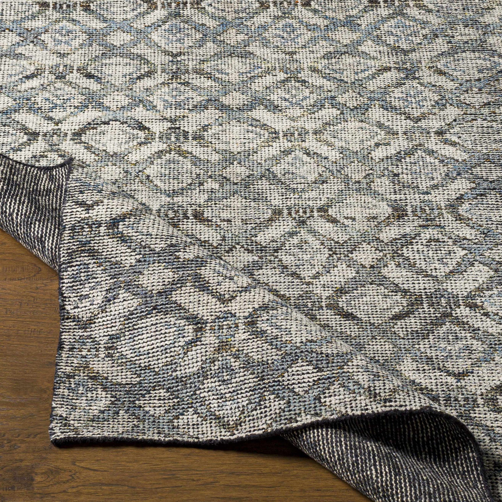 Maudsland Area Rug - Clearance