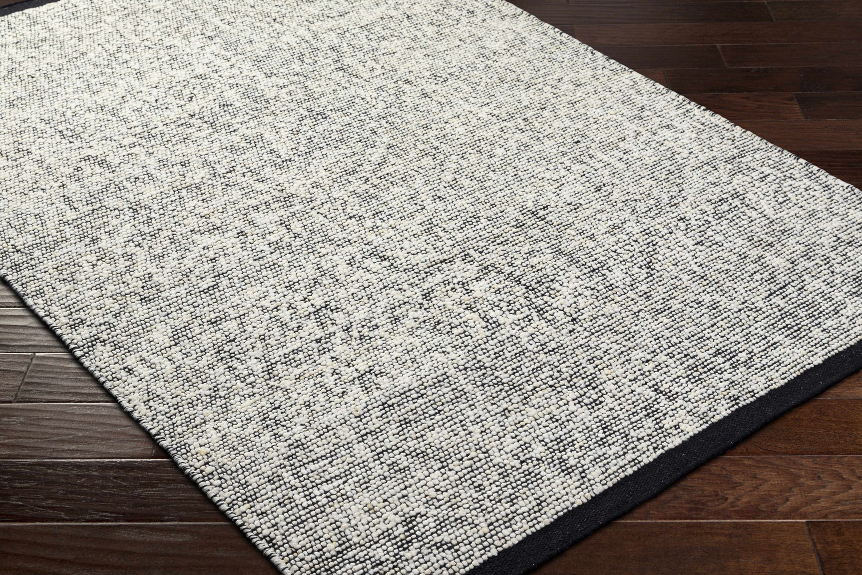 Nenet Black Hand Woven Area Rug - Clearance