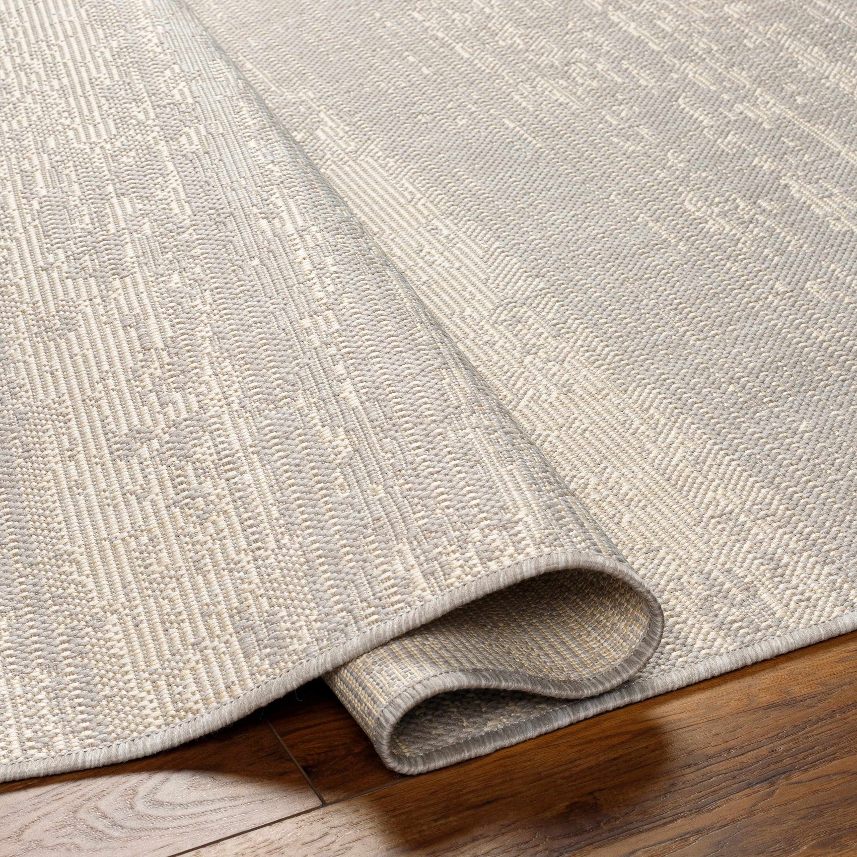 Cline Cream Outdoor Area Rug - Clearance