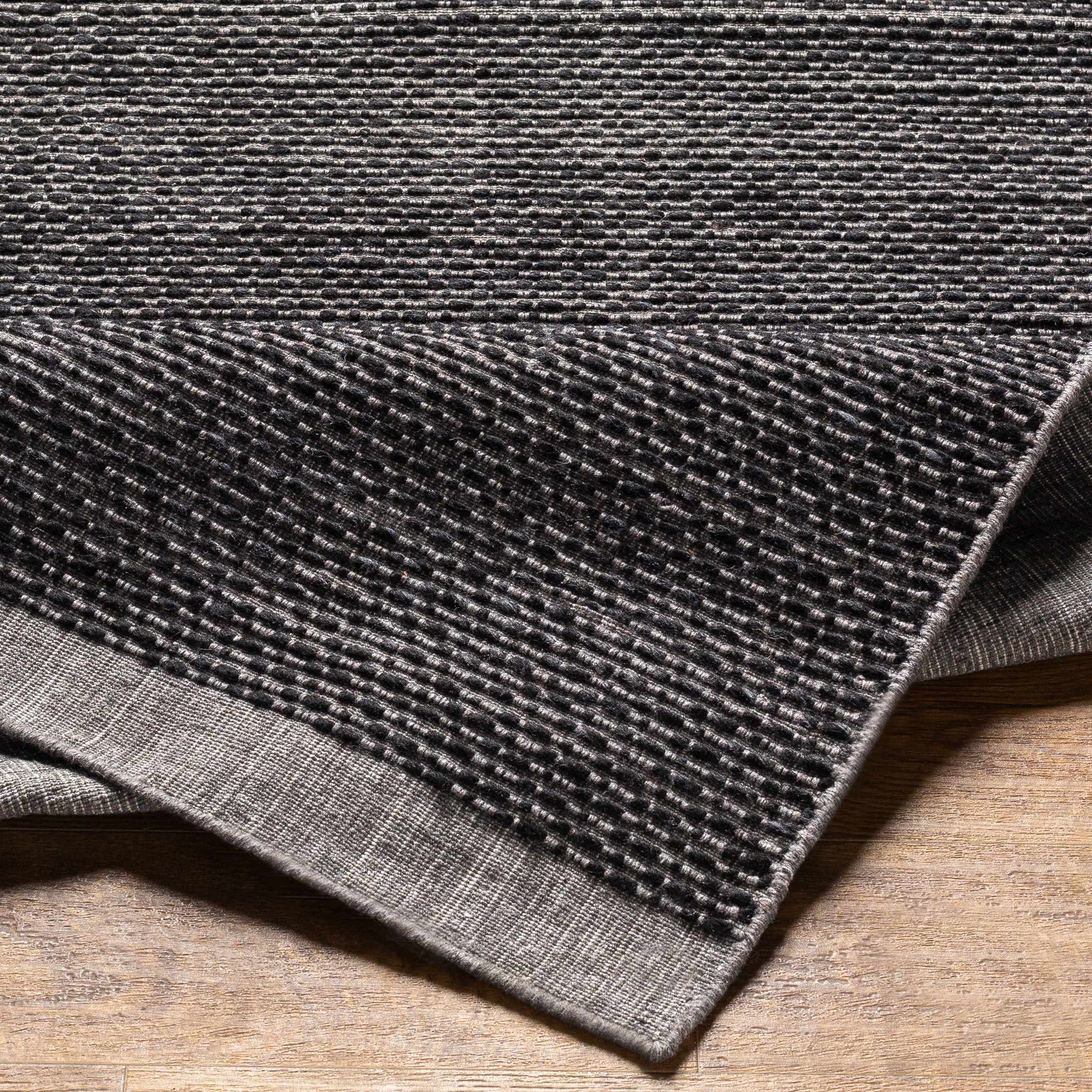 Yong Hand Loomed Black Rug - Clearance