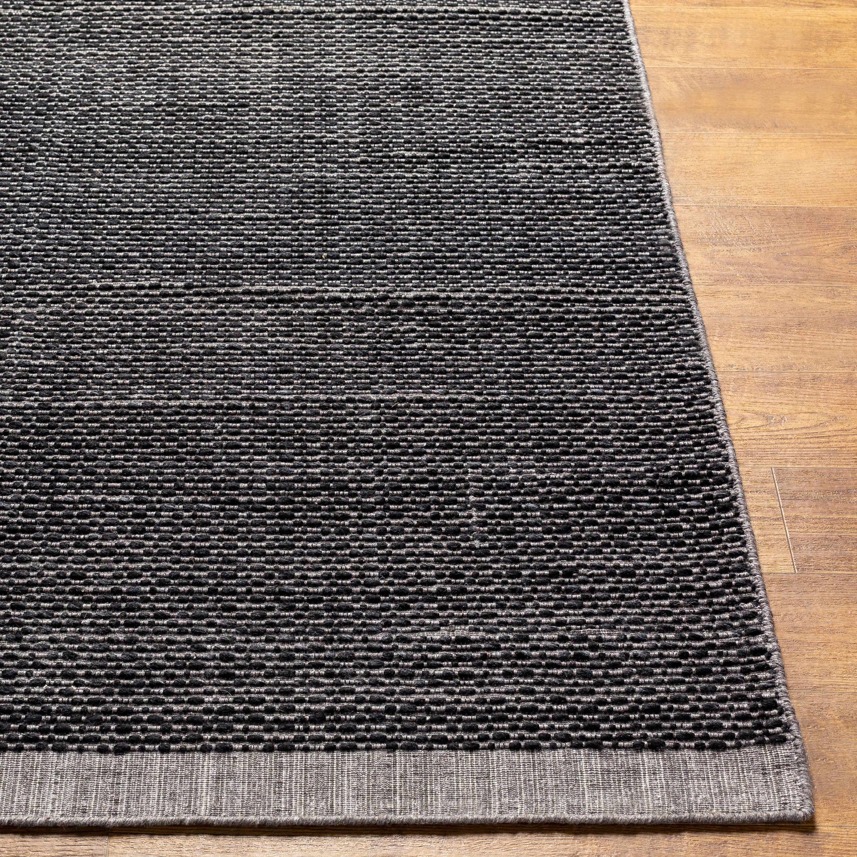 Yong Hand Loomed Black Rug - Clearance
