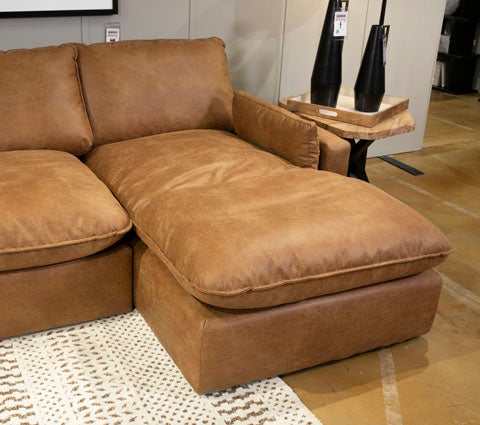 The Marlaina Caramel Sofa 3 Pc Sectional is available at Nashco Furniture &  Mattress Outlet store in Jacksonville, FL.