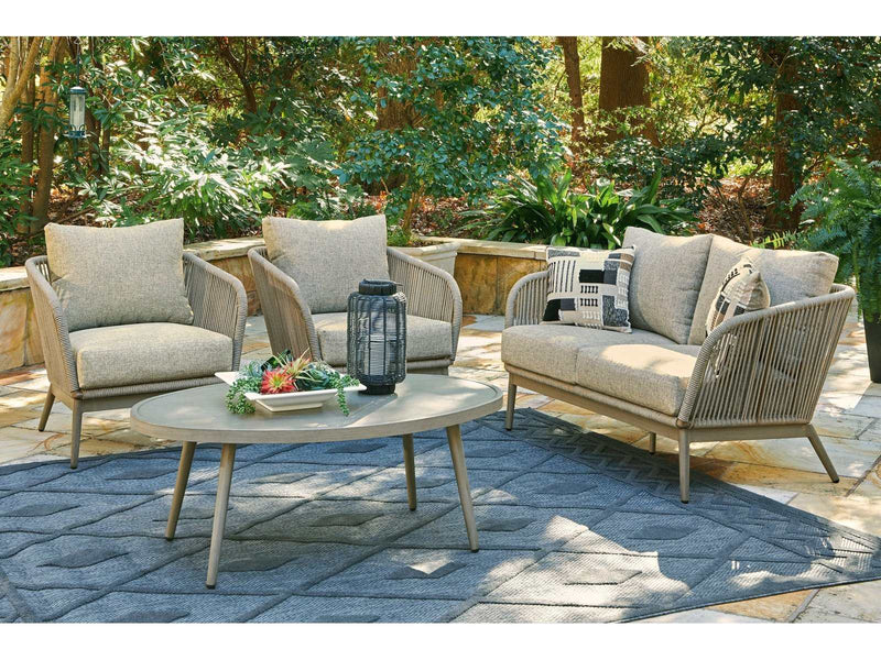 Swiss Valley Beige Oval Outdoor Coffee Table - Ornate Home