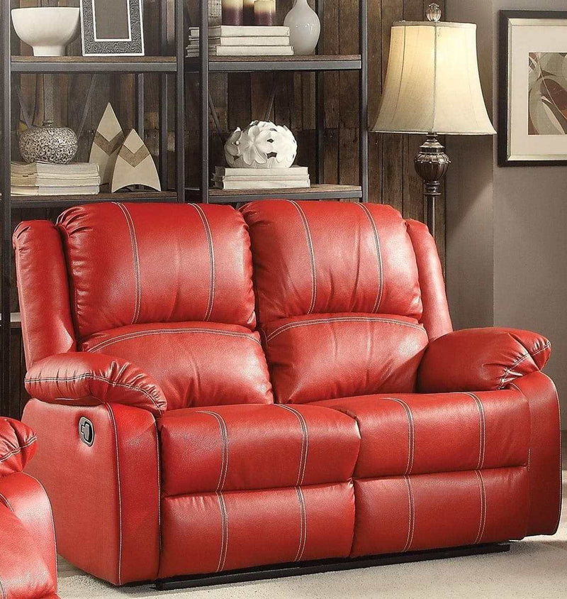 Zuriel Red Faux Leather Reclining Loveseat - Ornate Home